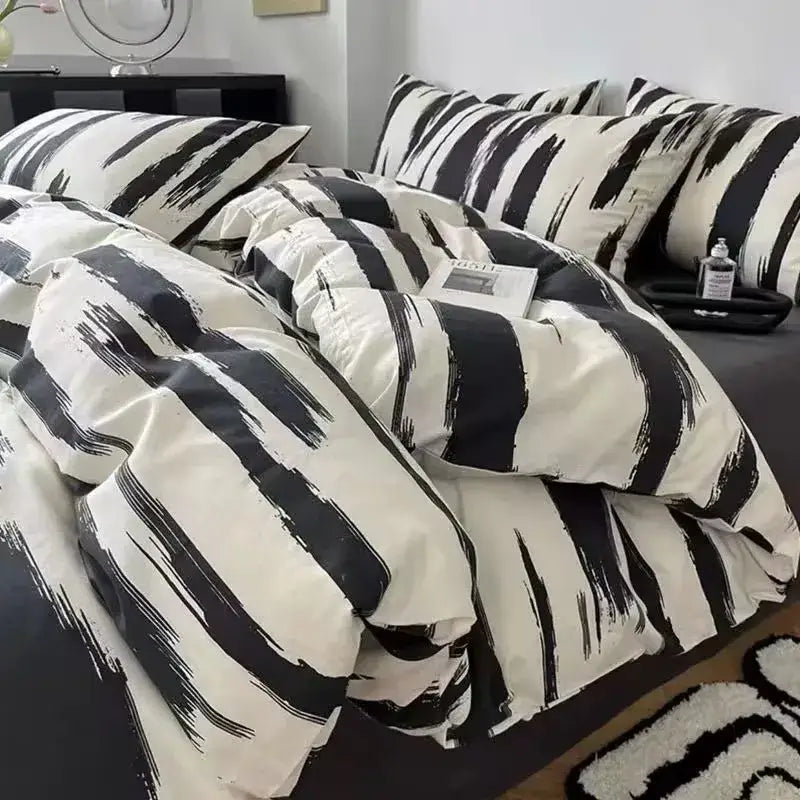Checkerboard black and beige satin duvet cover set featuring black and white brushstroke pattern for bedroom bedding