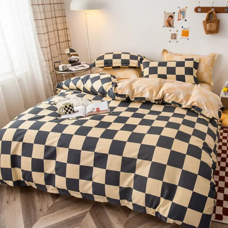 A cozy black and beige satin checkerboard duvet cover set with matching pillowcases for bedroom bedding