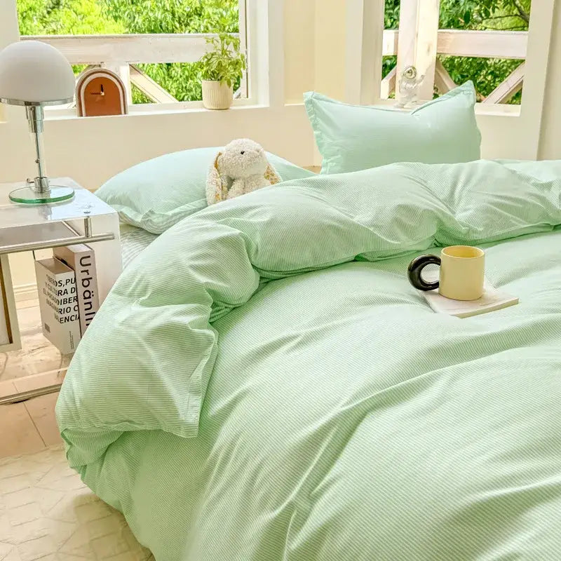 Mint green striped satin duvet cover set complementing checkerboard black and beige satin duvet cover set bedroom bedding