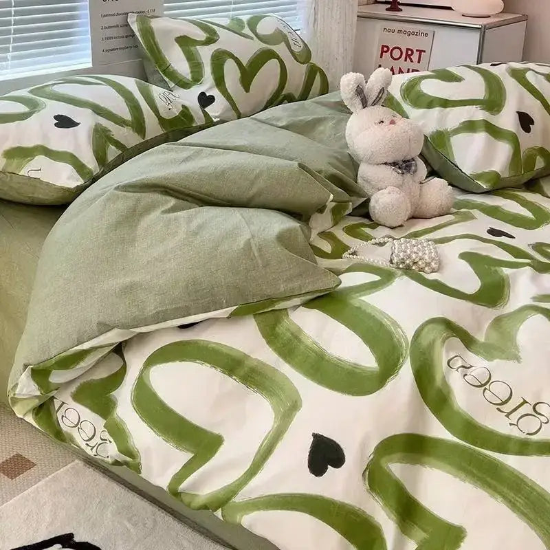Soft mint green and white duvet cover set with bold green brushstroke hearts and black accents for bedroom bedding