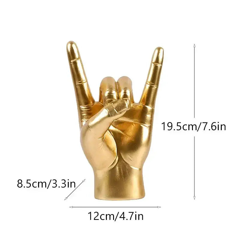 Chic black glossy rock hand gesture sculpture featuring a golden metallic hand gesture sculpture for living room decor