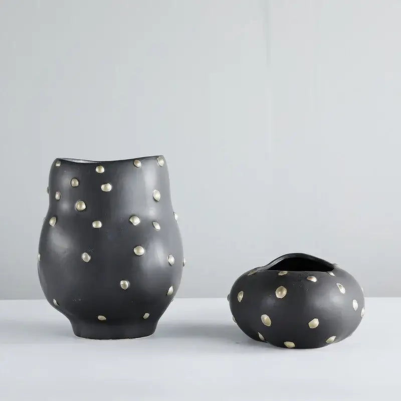 Chic black resin flower pot with gold accent featuring black ceramic vases with silver metallic dots for decorbites black resin decor
