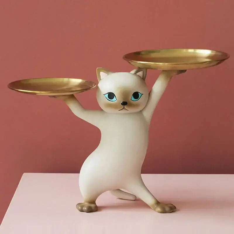 Cream-colored decorbites cat resin tray with blue eyes and gold-toned metal trays for living room decor accessory
