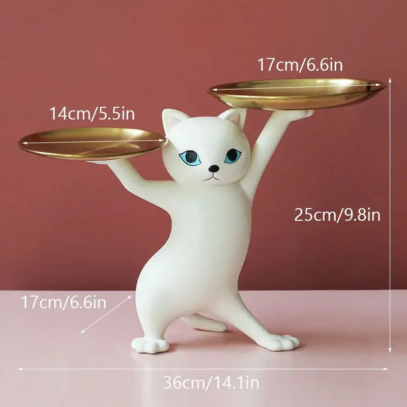 Chic cream and gold decorbites cat resin tray featuring a white ceramic cat with blue eyes balancing two gold plates