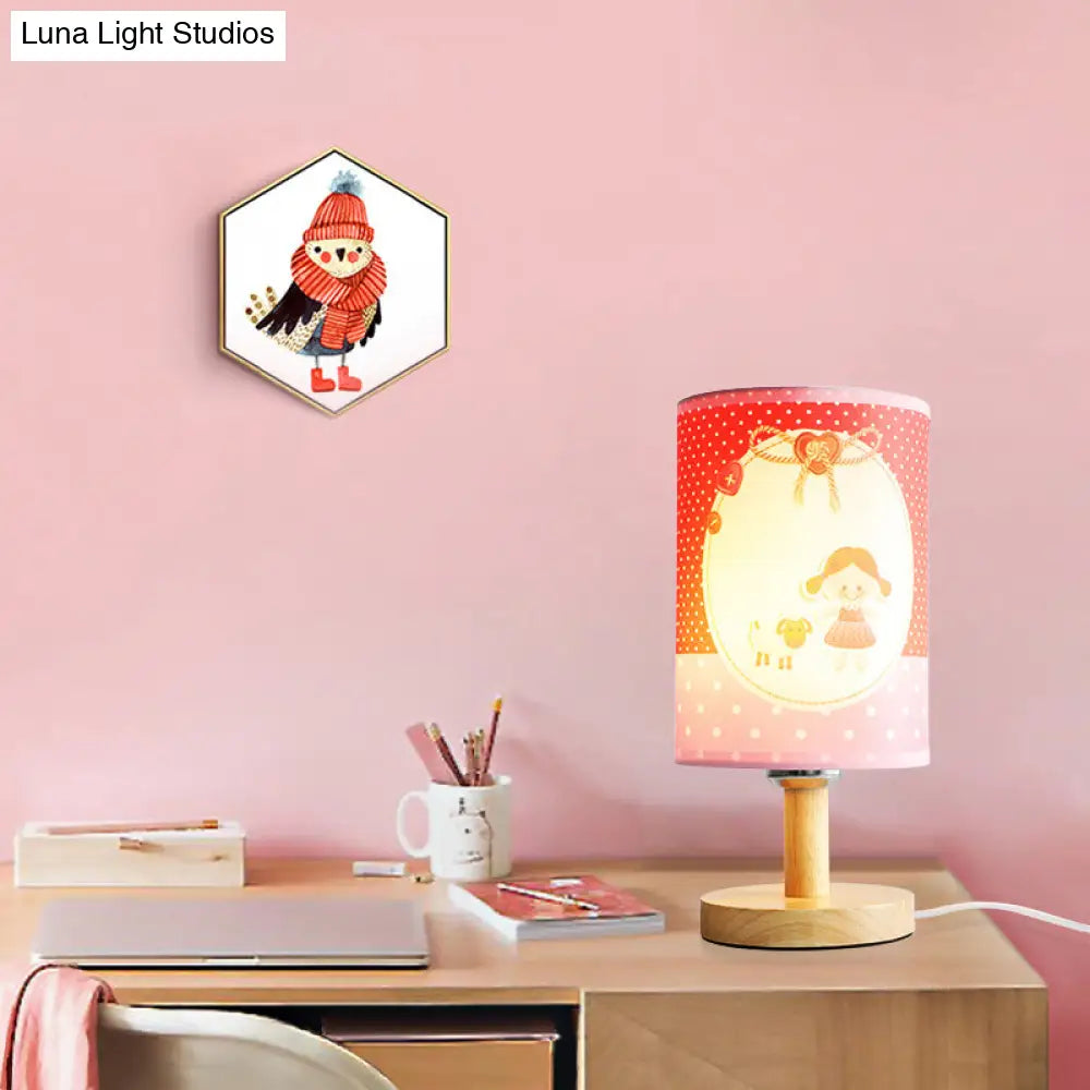Lámpara de escritorio rosa infantil: Lámpara cilíndrica de tela y madera, ligera y resistente, ideal para la habitación de las niñas.