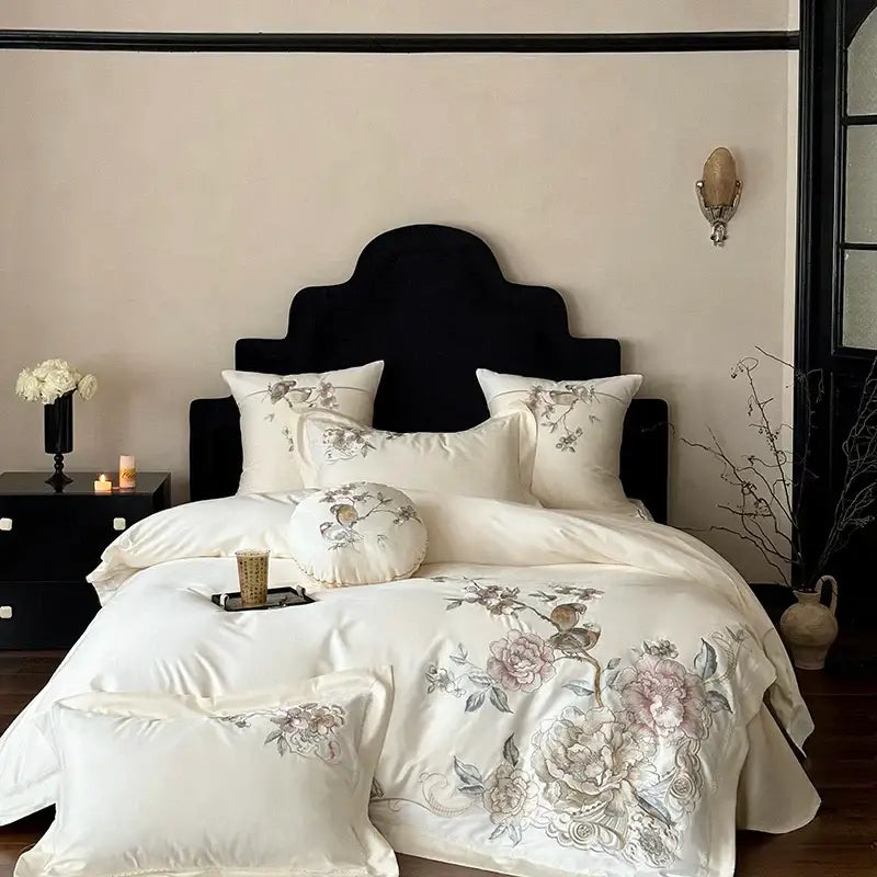 Cream-colored satin bedding set with delicate chinese flowers bird embroidery featuring soft pink and gray blossoms