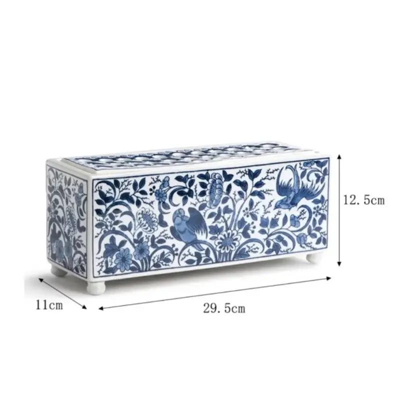A rectangular white porcelain flowerpot vase with intricate blue floral and bird motifs decorbites blue white decor