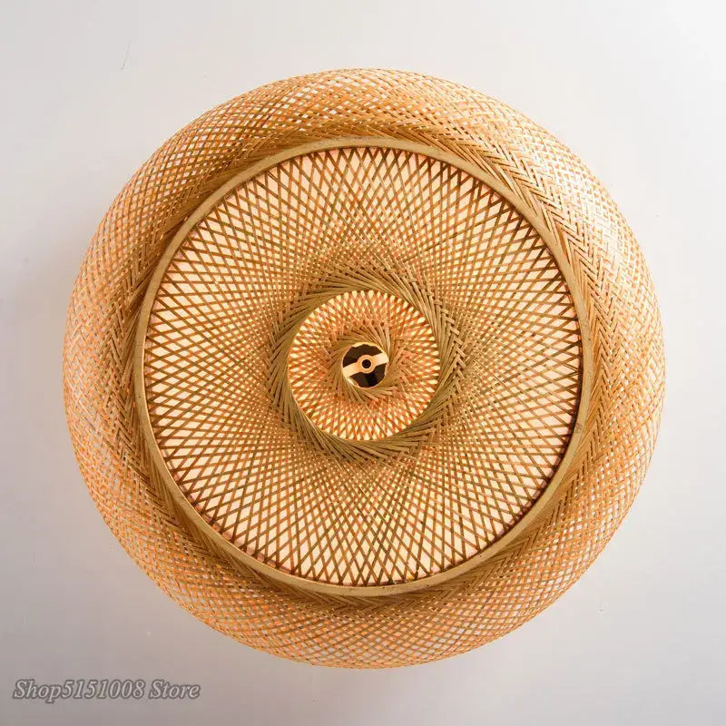 Chinese style bamboo wicker rattan round ceiling light with handwoven spiral pattern in natural golden brown hue
