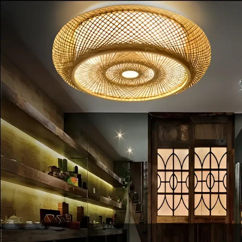 Golden woven bamboo wicker rattan round ceiling light with concentric circular patterns for living room use