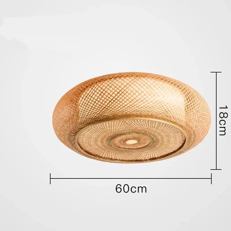 Chinese style bamboo wicker rattan round ceiling light with warm golden hue and intricate lattice pattern for living room
