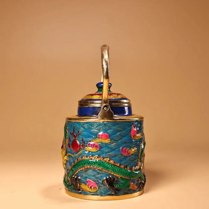 A vibrant blue enamel pan tea caddy with gold handle and decorbites dragon cloisonné design of green dragons and pink fish