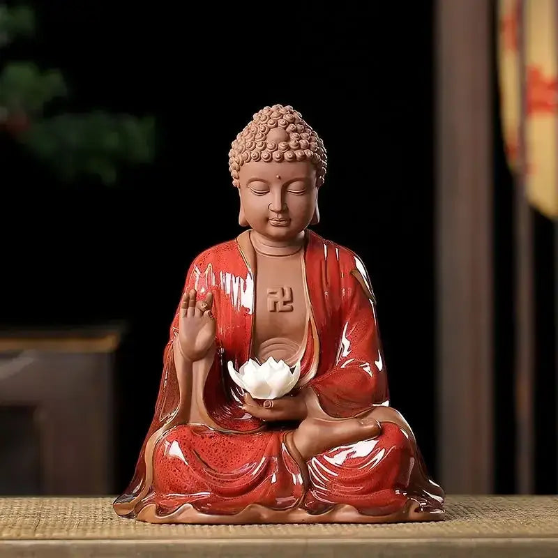 Glossy red ceramic sakyamuni buddha statue holding white lotus flower for living room decoration