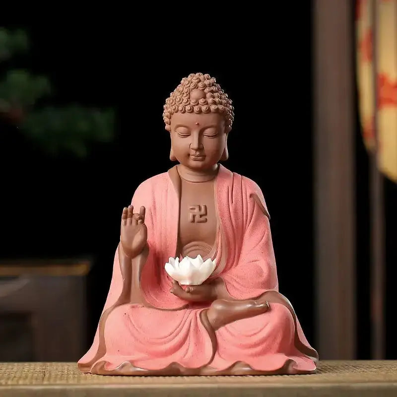 Pink ceramic sakyamuni buddha statue holding a white lotus with an incense burner design for living room decor