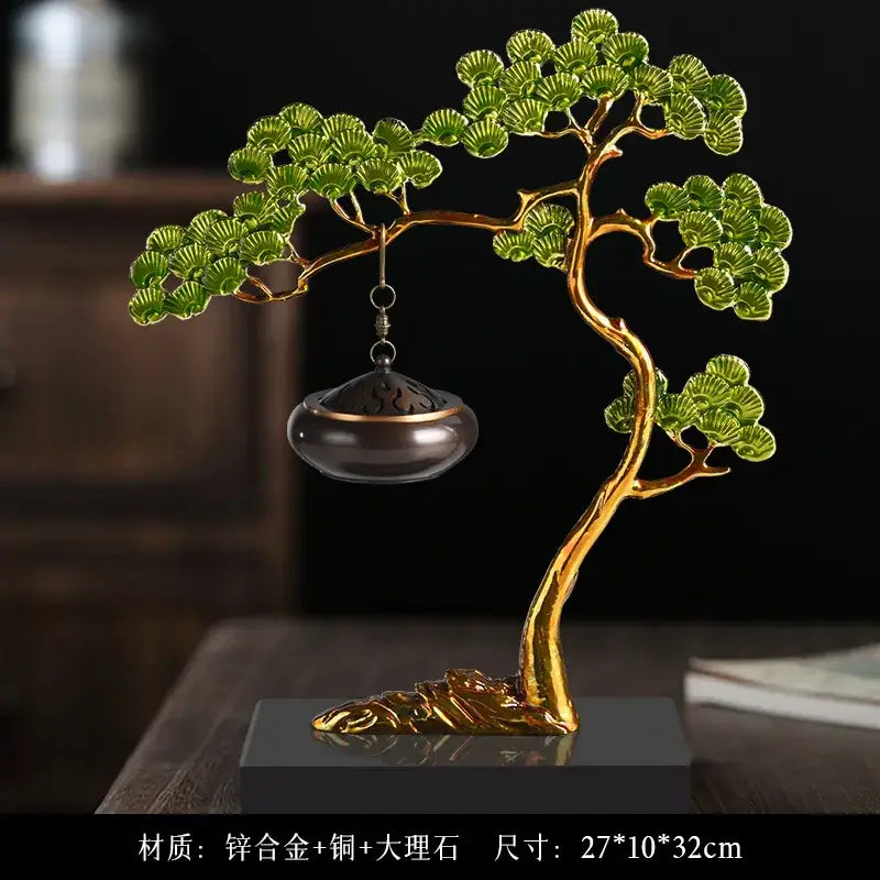 Golden resin bonsai tree sculpture with green enamel pine ornaments and hanging dark bronze incense burner for living room