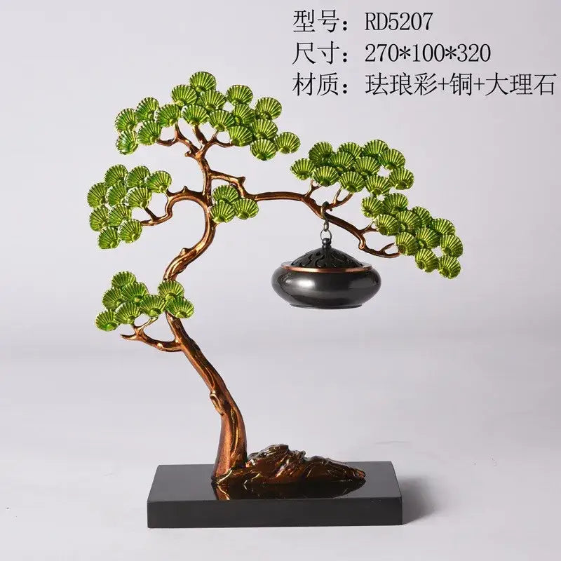 Chinese style gold enamel pine ornaments featuring a copper-toned bonsai tree sculpture with green leaves and incense burner