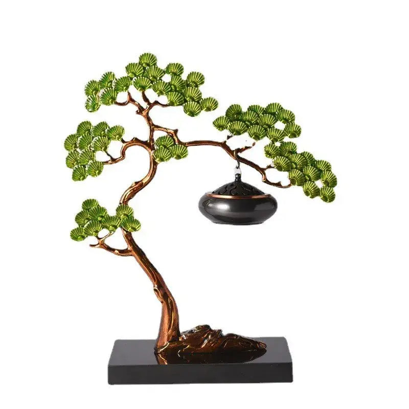 Bronze-colored bonsai tree sculpture with green enamel pine ornaments and a hanging black incense burner for living room use