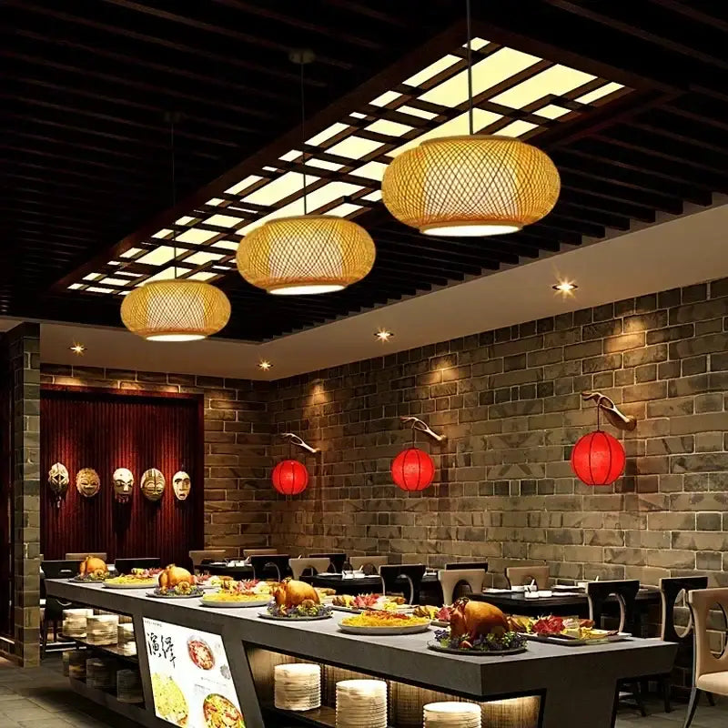Warm natural golden bamboo weave pendant lamps hang from the ceiling for Chinese style dining room lighting