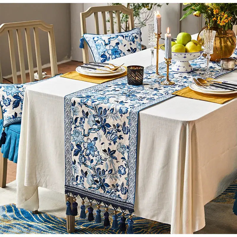 Blue white porcelain table runner with chinoiserie floral design and tassel trim for dining room decorbites blue white decor