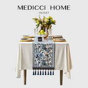 Chinoiserie blue and white porcelain table runner with floral design and tassels from medici home outlet decorbites blue white