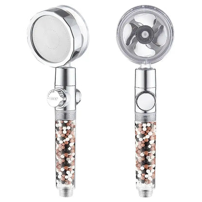Chrome 360 rotating filter shower head with chrome finish and transparent body filled with multicolored filtration beads enhancing shower experience