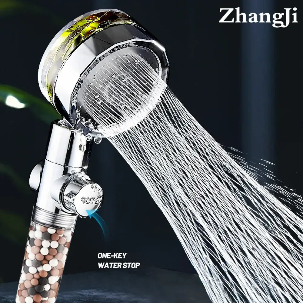 Chrome 360 rotating filter shower head with shiny chrome finish, transparent filter housing, multicolored beads, and water stop valve for enhanced shower experience