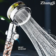 Chrome 360 rotating filter shower head with shiny chrome finish, transparent filter housing, multicolored beads, and water stop valve for enhanced shower experience