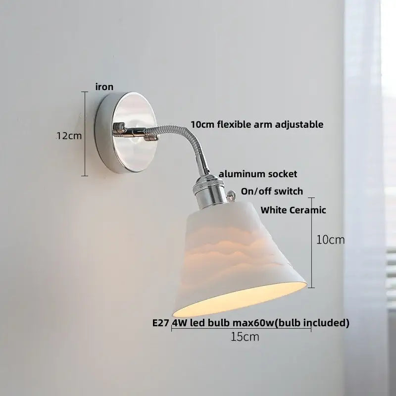 A chrome wall lamp with adjustable arm and white ceramic shade designed for bedroom decorbites adjustable arm use