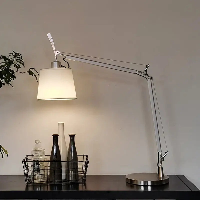 Chrome adjustable industrial wall light featuring a sleek silver articulated arm and white fabric shade for bedroom decorbites adjustable industrial use