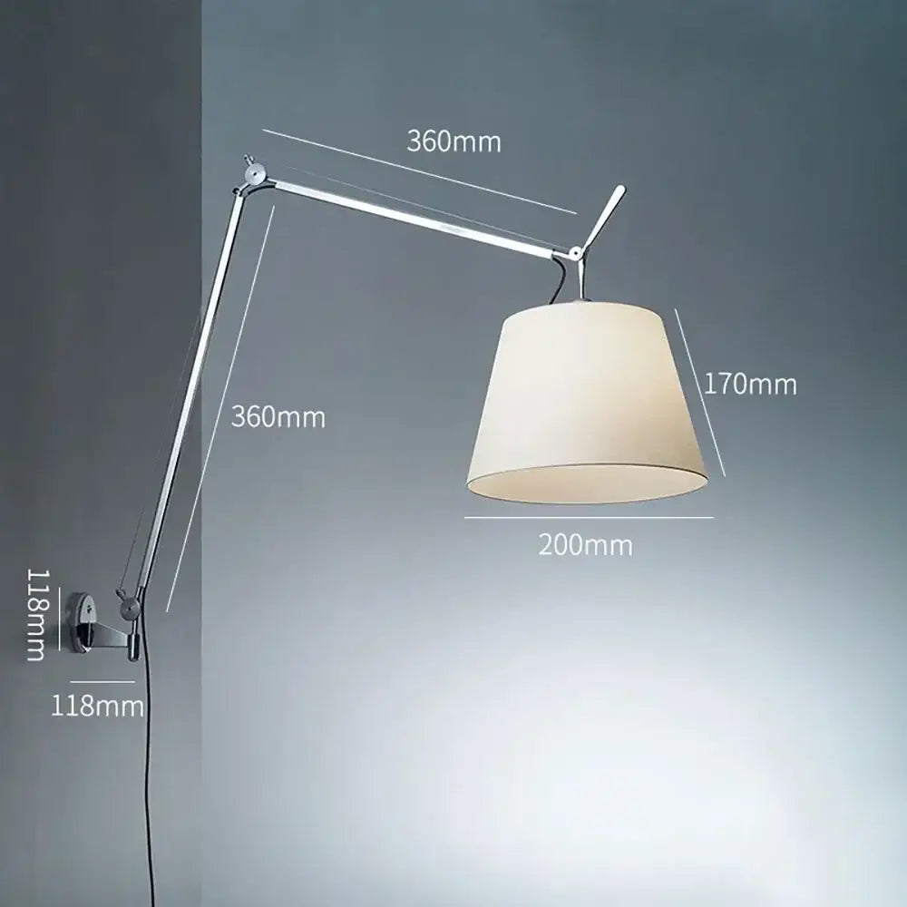 A chrome adjustable industrial wall light with articulated arm and off-white fabric shade for bedroom decorbites decor