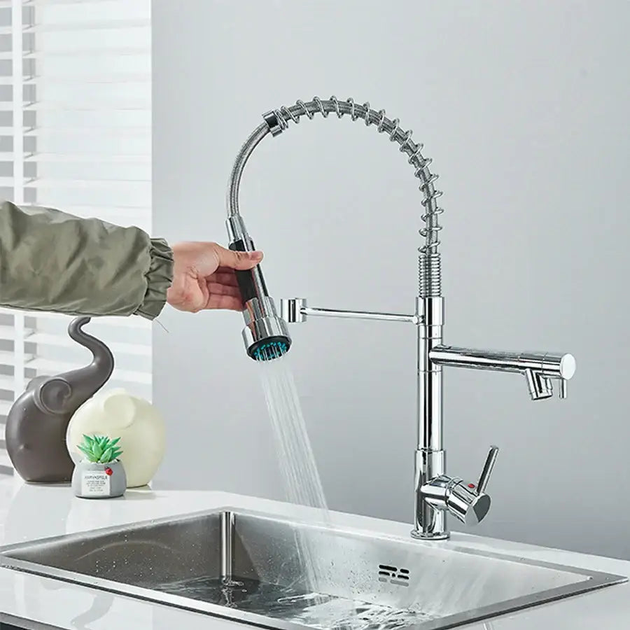 Chrome and black dual spout brass kitchen faucet with flexible coiled hose and dual spray heads decorbites dual spout design