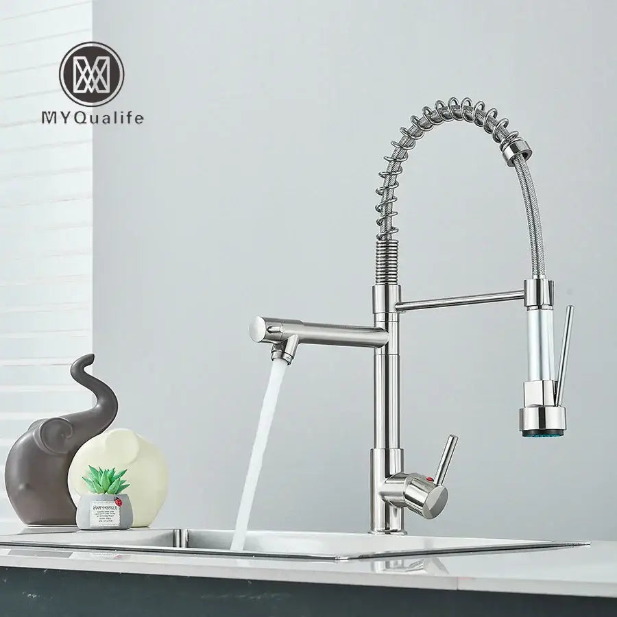 Chrome and black decorbites dual spout brass kitchen faucet with flexible coiled spout and pull-out spray head