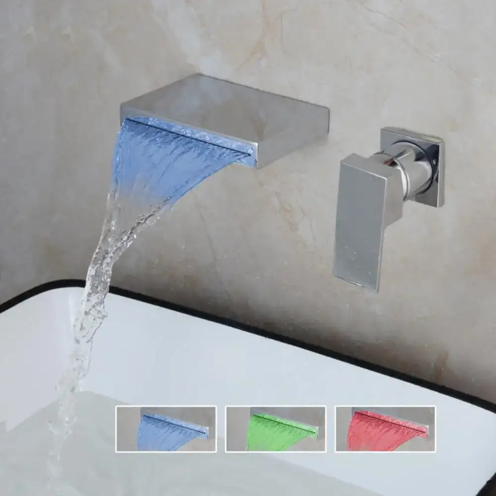 Modern chrome and black led waterfall bathtub faucet with sleek rectangular design and flowing blue water stream decorbites led waterfall