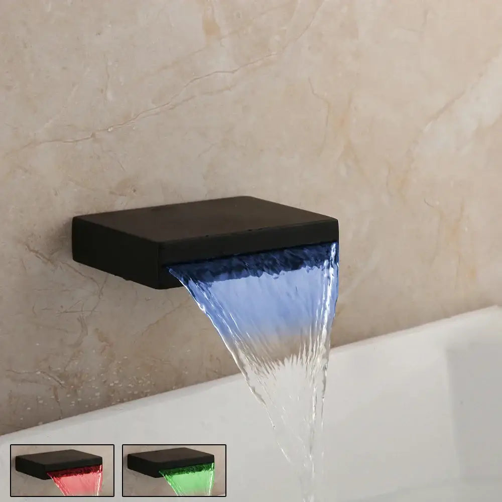 Black matte finished waterfall bathtub faucet with integrated led lighting casting blue glow decorbites led waterfall
