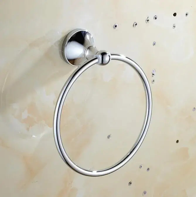 Chrome finished circular towel ring with polished metal design mounted on tiled wall from crystal bathroom set decorbites brass