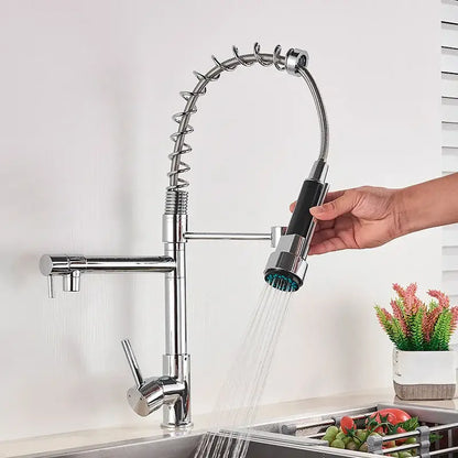 Chrome decorbites kitchen faucet with pull-down spring hose, chrome finish, flexible coiled hose, and black-grip spray head