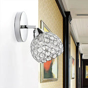 Chrome dome crystal wall sconce with spherical crystal globe design in chrome finish for living room lighting