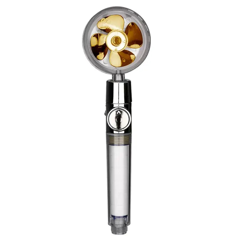 A sleek transparent chrome shower head with gold fan nozzle designed for high pressure water saving and filtration