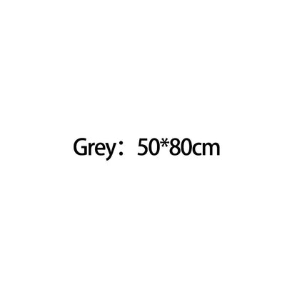 Grey rectangular mat 50 by 80 centimeters for use with chrome high pressure water saving shower head with filter