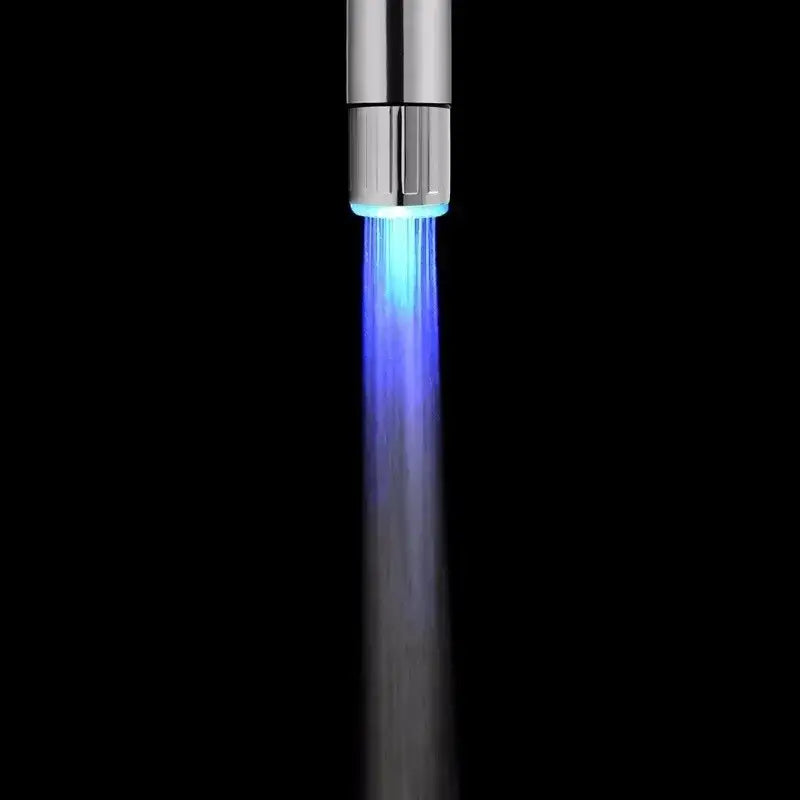 A sleek chrome led water faucet aerator with vibrant blue light illuminating flowing water for kitchen use