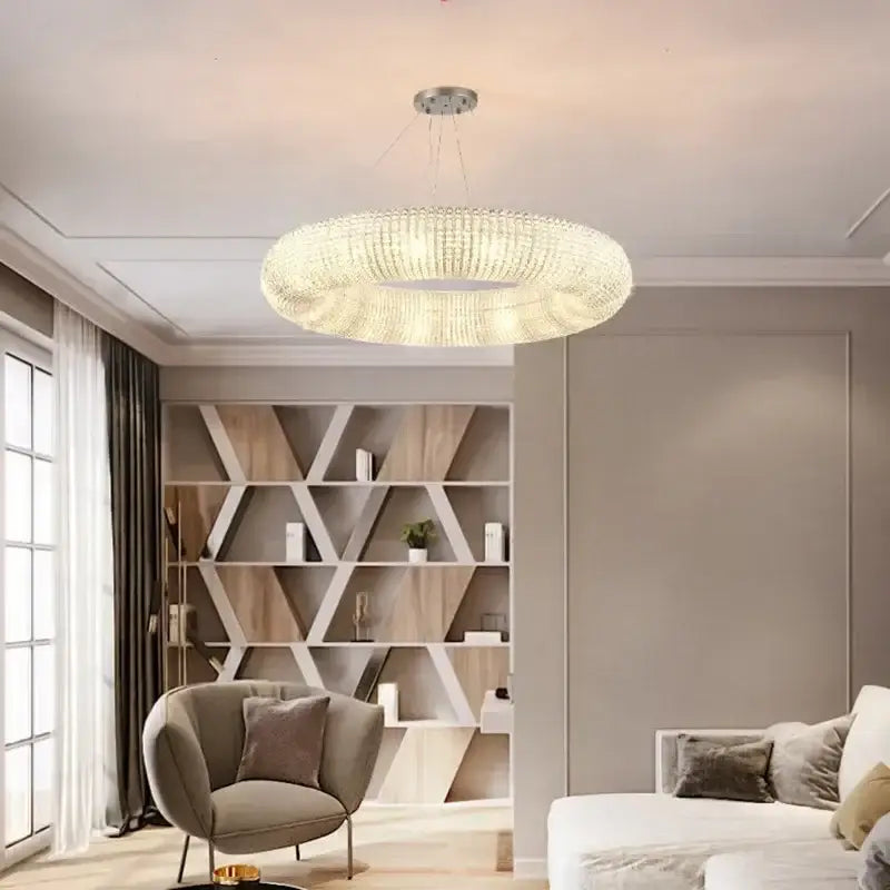 A chrome round crystal chandelier with clear crystal elements in concentric rings for modern living room decorbites chrome round