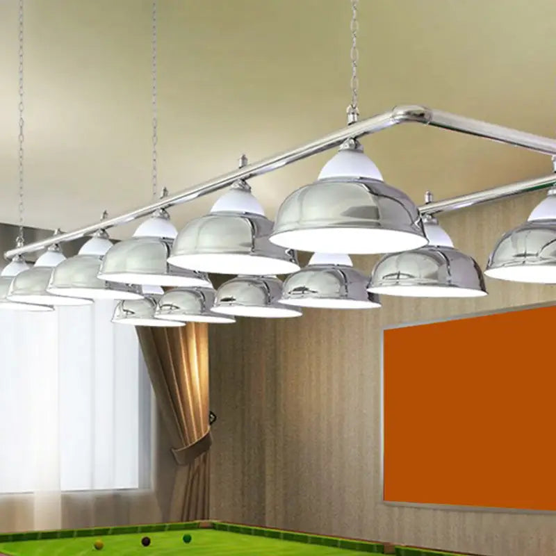 Chrome-finished dome-shaped pendant DecorBites™ stainless steel billiard light installed as game room ceiling fixture above pool table