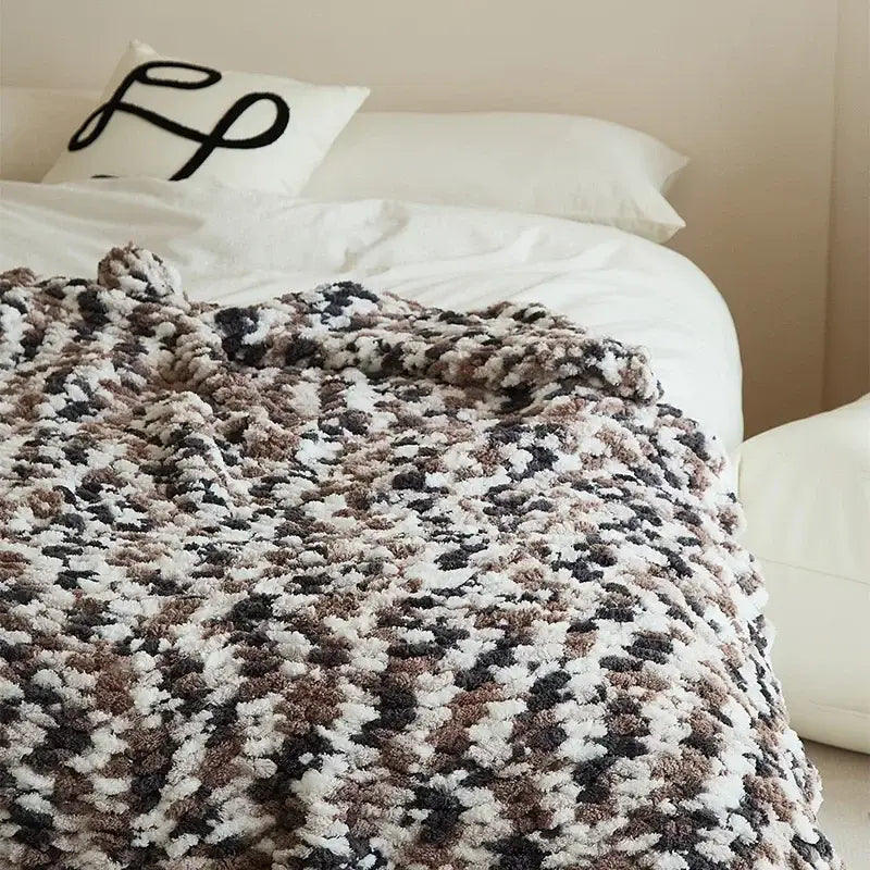 Cozy chunky knitted tricolor jacquard blanket throw in black white and brown for living room decor