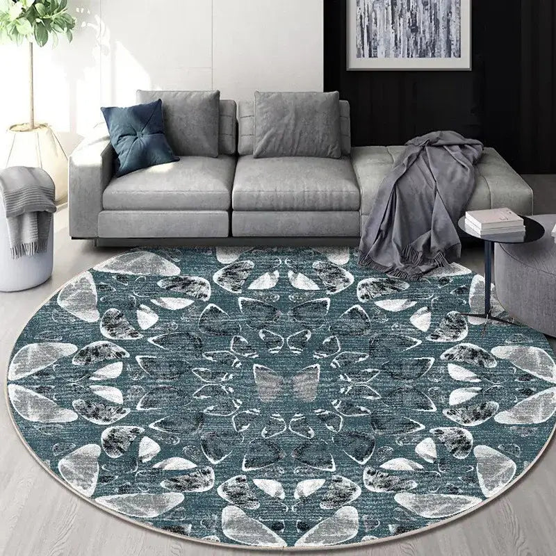 Circular geometric cashmere floor mat with symmetrical teal gray and white mandala design for beige living room decorbites
