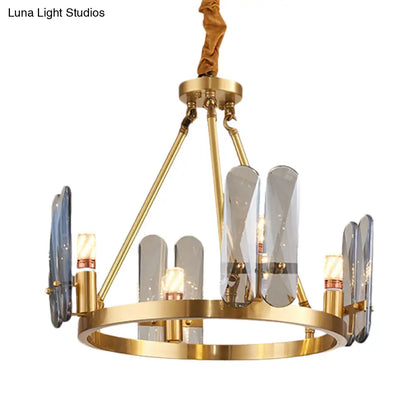 Lámpara de araña circular de latón con 4 cabezales modernistas y panel ovalado de cristal gris humo