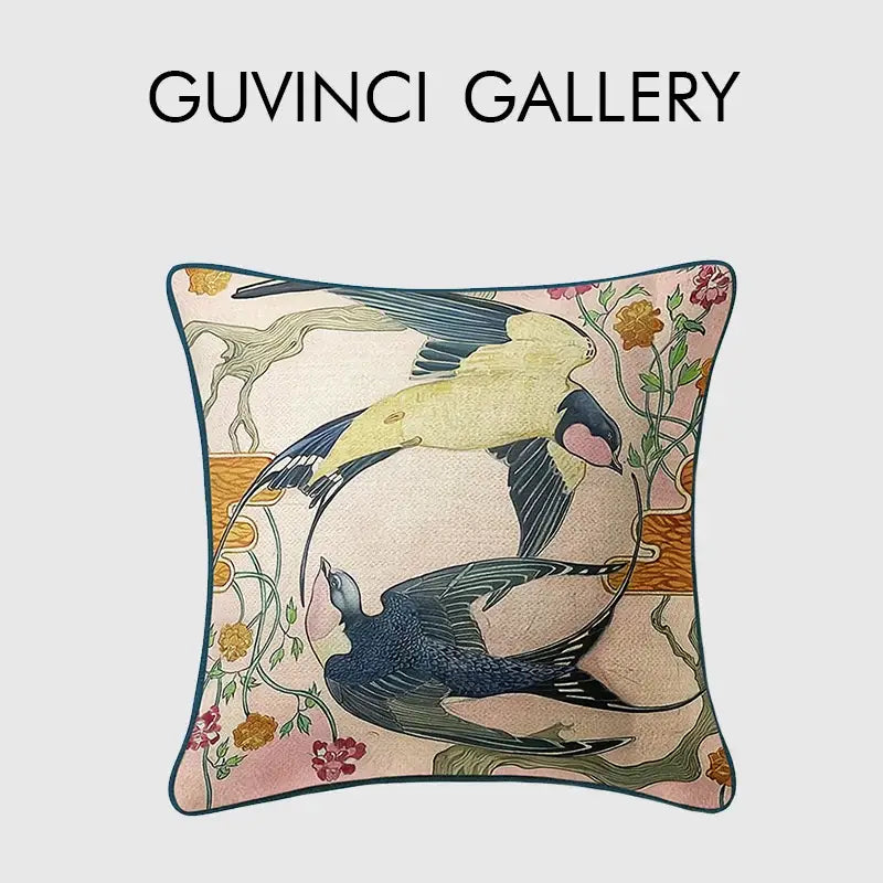 Square pillow cover with intricate embroidered circular swallows design on soft pink background with teal border decorbites circular swallows