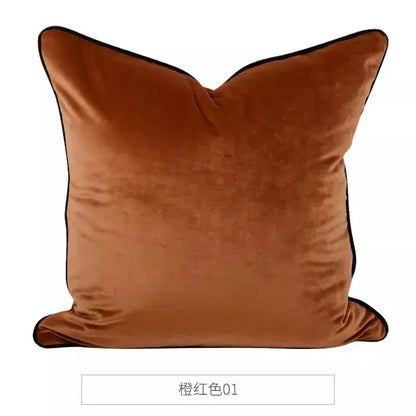 A plush burnt orange velvet cushion cover with black piping suitable for decorbites circus horse print living room decor