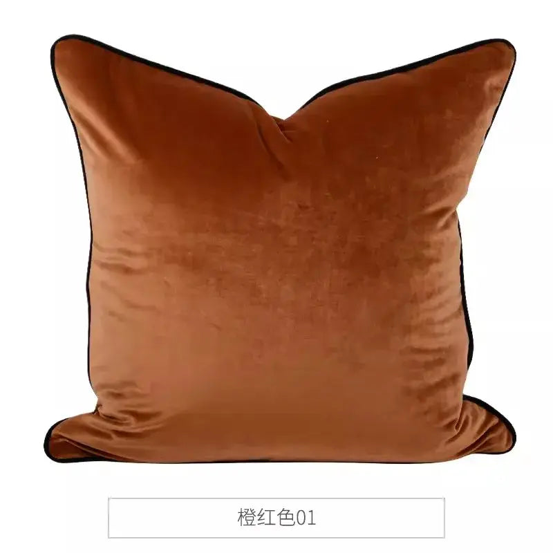 A plush burnt orange velvet cushion cover with black piping suitable for decorbites circus horse print living room decor