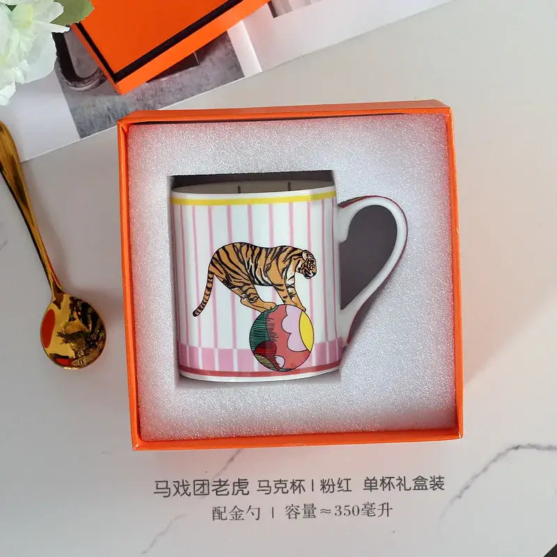 Pink and white striped ceramic mug with tiger illustration in orange gift box from decorbites circus troup kids tableware set