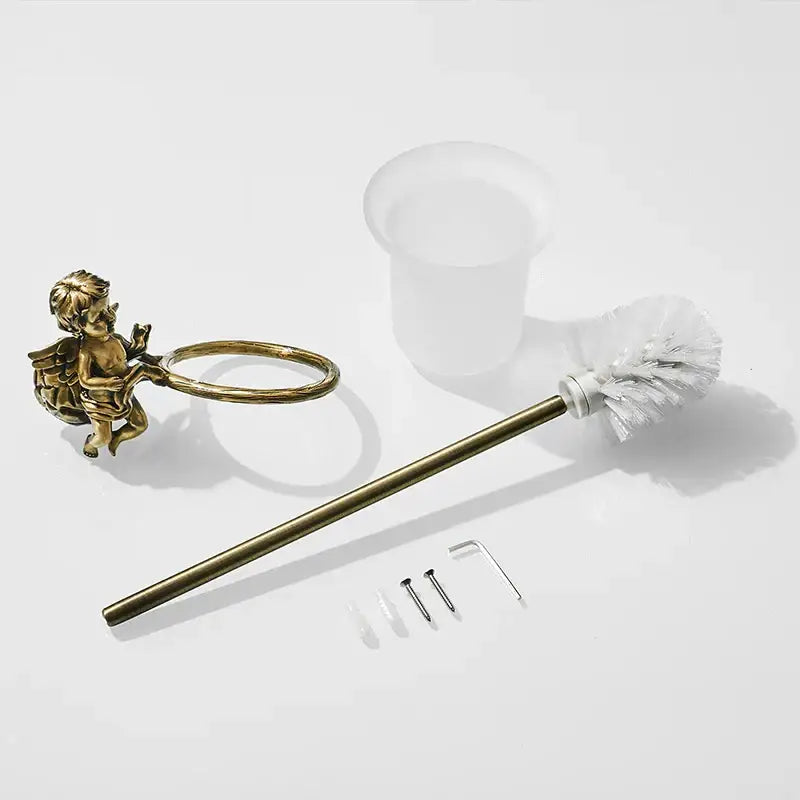 Gold-plated cherub-shaped classic angel brass toilet brush holder with curved ring handle and decorative wings for bathroom decorbites classic angel