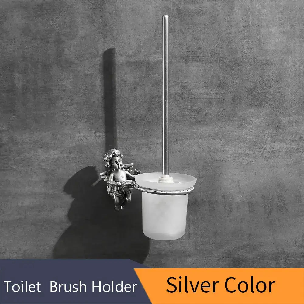 Silver-toned classic angel brass toilet brush holder with decorative cherub and frosted glass cup for bathroom decorbites classic angel